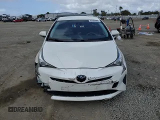2017 Toyota Prius Two with VIN JTDKBRFU1H3055116, listed as a Copart auction lot 51547065 with 118,416 mi miles and Salvage Title. Bid and sale history available at DreamBid. Image 5.