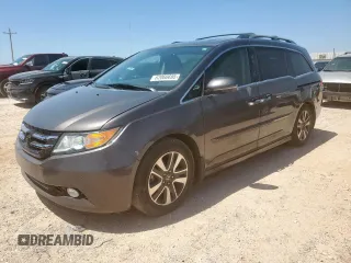 2015 Honda Odyssey Touring Elite z VIN 5FNRL5H97FB002739, wystawiony jako Copart lot #62060695 z przebiegiem 194 604 mil mil oraz Szkoda całkowita • Salvage title. Historia ofert i sprzedaży dostępna na DreamBid. Obrazek 1.