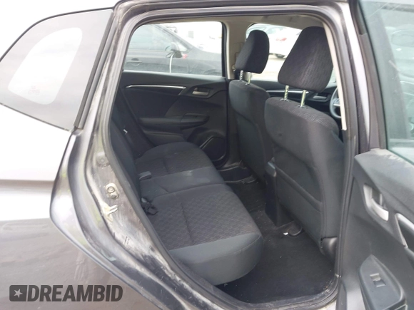 2015 Honda Fit LX with VIN 3HGGK5H58FM722880, listed as a IAAI auction lot 42276261 with 104,886 mi miles and . Bid and sale history available at DreamBid. Image 8.