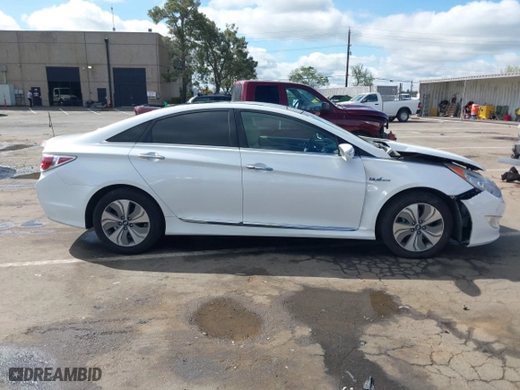 2015 Hyundai Sonata Hybrid Limited with VIN KMHEC4A40FA124788, listed as a IAAI auction lot 41936920 with 112,002 mi miles. Bid and sale history available at carsss.com. Image 13.
