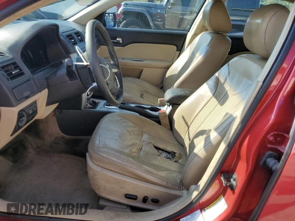 2011 Mercury Milan Premier with VIN 3MEHM0JA0BR601179, listed as a Copart auction lot 71642414 with 195,748 mi miles and Salvage title. Bid and sale history available at DreamBid. Image 7.