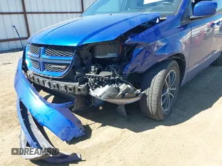 2019 Dodge Grand Caravan GT with VIN 2C4RDGEG4KR621924, listed as a IAAI auction lot 42068331 with 87,377 mi miles and . Bid and sale history available at DreamBid. Image 6.