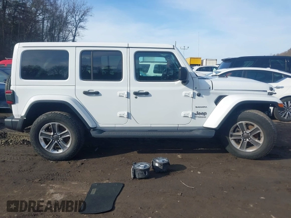 2021 Jeep Wrangler Unlimited Sahara with VIN 1C4HJXEG9MW532302, listed as a IAAI auction lot 41646755 with 32,893 mi miles and . Bid and sale history available at DreamBid. Image 14.
