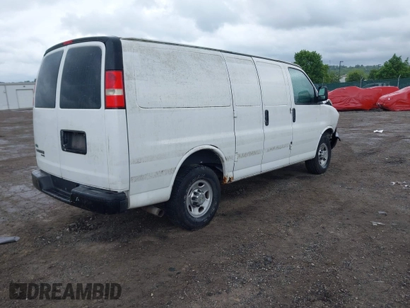 2012 Chevrolet Express Cargo with VIN 1GCWGFFA8C1108597, listed as a IAAI auction lot 42323808 with 200,965 mi miles and . Bid and sale history available at DreamBid. Image 4.