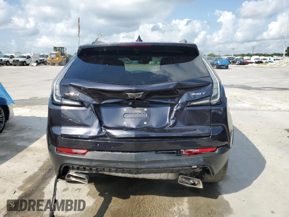 2022 Cadillac XT4 FWD Sport with VIN 1GYFZER46NF119009, listed as a Copart auction lot 57651725 with 37,896 mi miles and Salvage title. Bid and sale history available at DreamBid. Image 6.