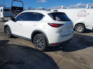 2018 Mazda CX-5 Grand Touring with VIN JM3KFBDM6J0435579, listed as a IAAI auction lot 41208899 with 131,212 mi miles. Bid and sale history available at carsss.com. Image 3.