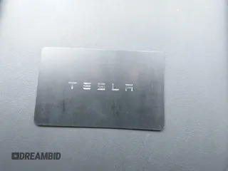 2023 Tesla Model Y Long Range z VIN 7SAYGAEE7PF691499, wystawiony jako IAAI lot #42038850 z przebiegiem 26 439 mil mil oraz . Historia ofert i sprzedaży dostępna na DreamBid. Obrazek 11.