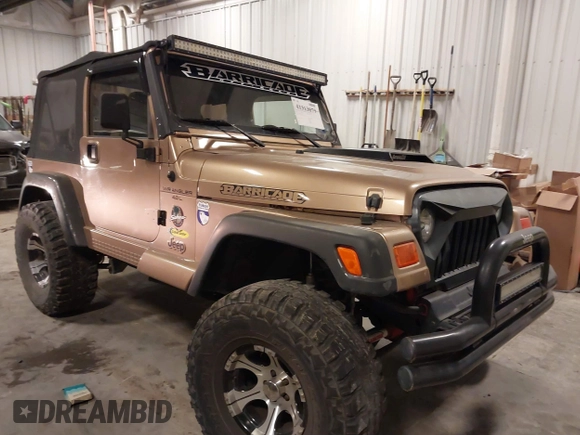 2000 Jeep Wrangler Sahara with VIN 1J4FA59S2YP740431, listed as a IAAI auction lot 41313079 with 183,989 mi miles. Bid and sale history available at carsss.com. Image 1.
