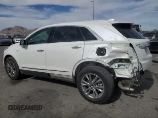 2021 Cadillac XT5 FWD Premium Luxury with VIN 1GYKNCRS0MZ110560, listed as a Copart auction lot 52779575 with 44,559 mi miles and Salvage title. Bid and sale history available at DreamBid. Image 2.