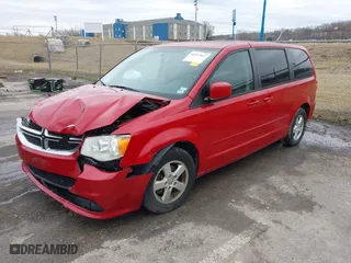2012 Dodge Grand Caravan SXT with VIN 2C4RDGCG3CR408077, listed as a IAAI auction lot 41532827 with 170,716 mi miles. Bid and sale history available at carsss.com. Image 20.