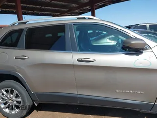 2021 Jeep Cherokee Altitude with VIN 1C4PJLLBXMD155096, listed as a IAAI auction lot 41746319 with 99,423 mi miles and . Bid and sale history available at DreamBid. Image 14.