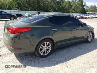 2013 Kia Optima EX с VIN 5XXGN4A77DG108218, выставлен на аукционе Copart как лот 57728815 с пробегом 162 475 миль миль и Списание • Salvage title. История ставок и продаж доступна на DreamBid. Изображение 3.