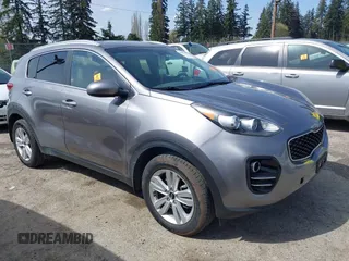 2017 Kia Sportage LX z VIN KNDPMCAC8H7242857, wystawiony jako IAAI lot #42004142 z przebiegiem 70 890 mil mil oraz . Historia ofert i sprzedaży dostępna na DreamBid. Obrazek 1.