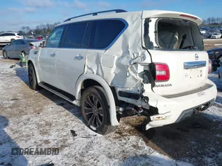 2019 Nissan Armada Platinum with VIN JN8AY2NE9K9759942, listed as a IAAI auction lot 41348179 with 114,902 mi miles. Bid and sale history available at carsss.com. Image 3.