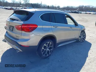2021 BMW X1 xDrive28i with VIN WBXJG9C06M5S85511, listed as a IAAI auction lot 41705422 with 30,636 mi miles. Bid and sale history available at carsss.com. Image 4.