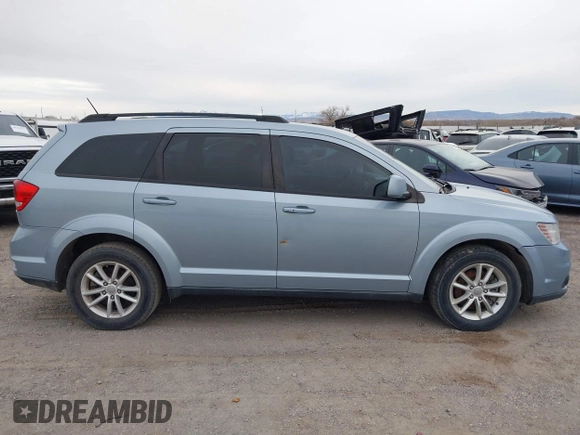 2013 Dodge Journey SXT with VIN 3C4PDDBG2DT724768, listed as a IAAI auction lot 40926457 with 150,862 mi miles and . Bid and sale history available at DreamBid. Image 13.