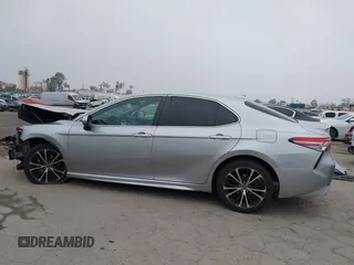 2019 Toyota Camry LE z VIN 4T1B11HK7KU713082, wystawiony jako IAAI lot #42151362 z przebiegiem 93 546 mil mil oraz . Historia ofert i sprzedaży dostępna na DreamBid. Obrazek 15.