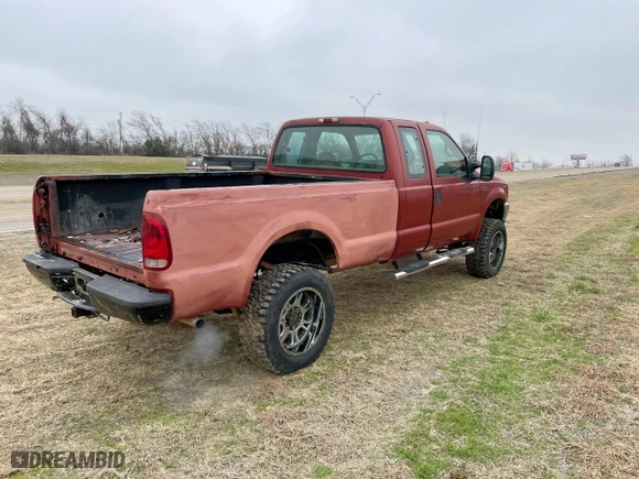 2000 Ford Super Duty F-250 XL with VIN 1FTNX21S6YEC84441, listed as a Copart auction lot 52230615 with 163,757 mi miles and Clean Title. Bid and sale history available at carsss.com. Image 4.