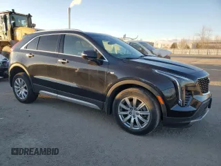2022 Cadillac XT4 AWD Premium Luxury with VIN 1GYFZDR45NF109999, listed as a Copart auction lot 84618914 with 66,697 mi miles and Clean title. Bid and sale history available at DreamBid. Image 4.