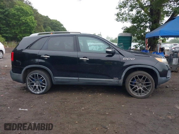 2012 Kia Sorento LX z VIN 5XYKTDA20CG218154, wystawiony jako IAAI lot #42428383 z przebiegiem 126 889 mil mil oraz . Historia ofert i sprzedaży dostępna na DreamBid. Obrazek 13.