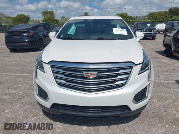 2017 Cadillac XT5 Premium Luxury FWD z VIN 1GYKNCRS5HZ230621, wystawiony jako IAAI lot #42123597 z przebiegiem 88 268 mil mil oraz . Historia ofert i sprzedaży dostępna na DreamBid. Obrazek 13.