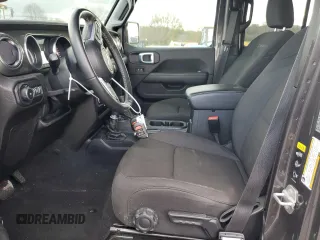 2022 Jeep Wrangler Unlimited Sahara Altitude with VIN 1C4HJXEG9NW269598, listed as a Copart auction lot 80495964 with 23,869 mi miles and Salvage title. Bid and sale history available at DreamBid. Image 7.