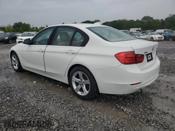 2014 BMW 3 Series 320i xDrive with VIN WBA3C3G50ENS67198, listed as a Copart auction lot 61654205 with 86,126 mi miles and Salvage title. Bid and sale history available at DreamBid. Image 2.
