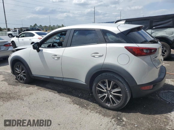 2017 Mazda CX-3 Touring z VIN JM1DKDC78H0150588, wystawiony jako Copart lot #55284205 z przebiegiem 78 923 mil mil oraz Szkoda całkowita • Salvage title. Historia ofert i sprzedaży dostępna na DreamBid. Obrazek 2.