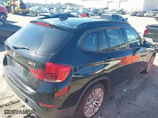 2013 BMW X1 28i with VIN WBAVM1C51DVW41977, listed as a IAAI auction lot 41607741 with 158,258 mi miles. Bid and sale history available at carsss.com. Image 4.
