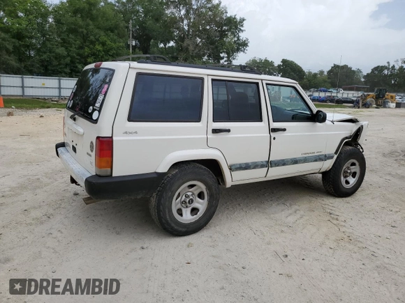 2001 Jeep Cherokee Sport with VIN 1J4FF48S31L520760, listed as a Copart auction lot 59807625 with 298,489 mi miles and Salvage title. Bid and sale history available at DreamBid. Image 3.