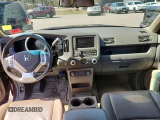 2007 Honda Ridgeline RTL z VIN 2HJYK16537H545407, wystawiony jako Copart lot #55645055 z przebiegiem 152 138 mil mil oraz Czysty tytuł • Clean title. Historia ofert i sprzedaży dostępna na DreamBid. Obrazek 9.