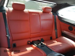 2011 BMW 3 Series 335is with VIN WBAKG1C52BE617713, listed as a Copart auction lot 74064204 with 132,742 mi miles and Salvage Title. Bid and sale history available at carsss.com. Image 10.