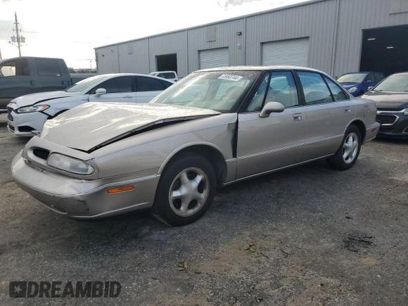 1997 Oldsmobile LSS z VIN 1G3HY52K9V4823565, wystawiony jako Copart lot #73965744 z przebiegiem 74 973 mil mil oraz Szkody całkowita. Historia ofert i sprzedaży dostępna na DreamBid. Obrazek 1.