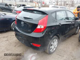 2012 Hyundai Accent SE with VIN KMHCU5AE7CU004466, listed as a IAAI auction lot 41602472 with 144,843 mi miles. Bid and sale history available at carsss.com. Image 4.