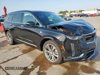 2021 Cadillac XT6 Premium Luxury z VIN 1GYKPCRS3MZ195999, wystawiony jako Copart lot #53261595 z przebiegiem 81 843 mil mil oraz Szkoda całkowita • Salvage title. Historia ofert i sprzedaży dostępna na DreamBid. Obrazek 4.