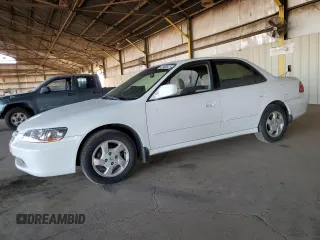 2000 Honda Accord EX z VIN JHMCG5654YC039286, wystawiony jako Copart lot #43988985 z przebiegiem 266 785 mil mil oraz Szkoda całkowita • Salvage title. Historia ofert i sprzedaży dostępna na DreamBid. Obrazek 1.
