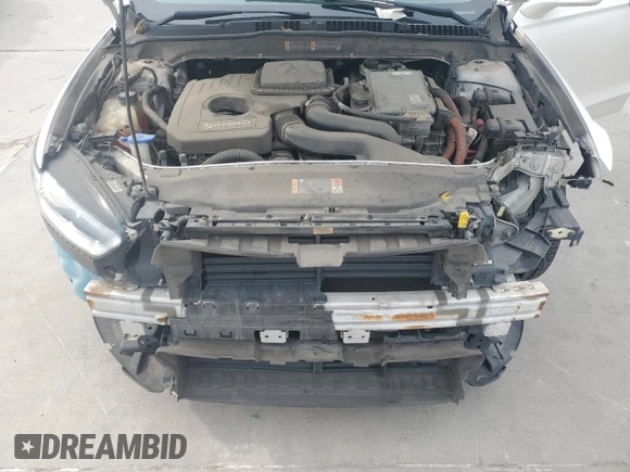 2013 Ford Fusion Titanium Hybrid с VIN 3FA6P0RU3DR282013, выставлен на аукционе Copart как лот 53651595 с пробегом 133 214 миль миль и Списание • Salvage title. История ставок и продаж доступна на DreamBid. Изображение 11.