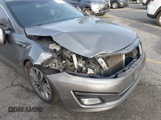 2014 Kia Optima SX Turbo with VIN 5XXGR4A63EG291596, listed as a IAAI auction lot 41385491 with 265,017 mi miles and . Bid and sale history available at DreamBid. Image 6.