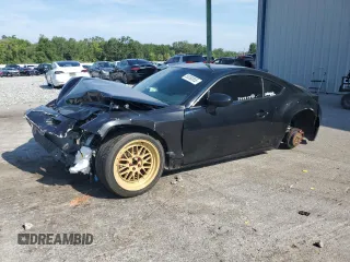 2023 Toyota 86 z VIN JF1ZNBB14P9754234, wystawiony jako Copart lot #58380855 z przebiegiem 25 648 mil mil oraz Nie do naprawy • Non repairable. Historia ofert i sprzedaży dostępna na DreamBid. Obrazek 1.