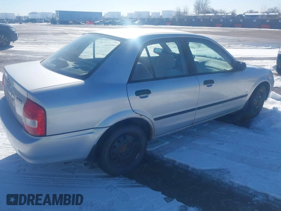 2002 Mazda Protege DX with VIN JM1BJ225321588015, listed as a IAAI auction lot 41409015 with 170,815 mi miles and . Bid and sale history available at DreamBid. Image 4.