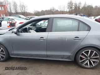 2012 Volkswagen Jetta GLI Autobahn with VIN 3VW5A7AJ5CM410777, listed as a IAAI auction lot 41729287 with 116,427 mi miles and . Bid and sale history available at DreamBid. Image 14.
