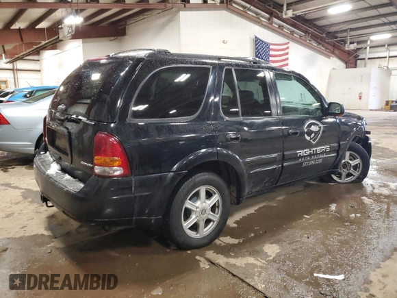 2002 Oldsmobile Bravada z VIN 1GHDT13S522107056, wystawiony jako Copart lot #86296454 z przebiegiem 169 856 mil mil oraz Tytuł czysty. Historia ofert i sprzedaży dostępna na DreamBid. Obrazek 3.