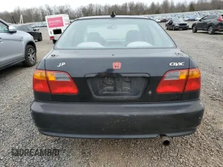 1999 Honda Civic LX with VIN 2HGEJ6677XH585273, listed as a Copart auction lot 51164635 with 184,874 mi miles and Salvage Title. Bid and sale history available at DreamBid. Image 6.