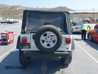 2003 Jeep Wrangler X with VIN 1J4FA39S73P321181, listed as a IAAI auction lot 42462732 with 170,460 mi miles and . Bid and sale history available at DreamBid. Image 17.