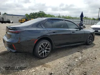 2024 BMW 7 Series 760i xDrive with VIN WBA33EJ05RCS20369, listed as a Copart auction lot 58822485 with 14,554 mi miles and Salvage title. Bid and sale history available at DreamBid. Image 3.