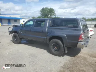2014 Toyota Tacoma with VIN 3TMLU4EN2EM163797, listed as a Copart auction lot 61078805 with 130,748 mi miles and Salvage title. Bid and sale history available at DreamBid. Image 2.