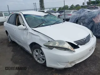 2006 Toyota Camry LE z VIN 4T1BF30K96U627349, wystawiony jako IAAI lot #42063012 z przebiegiem 185 823 mil mil oraz . Historia ofert i sprzedaży dostępna na DreamBid. Obrazek 1.