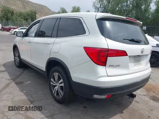2016 Honda Pilot EX-L with VIN 5FNYF5H55GB015166, listed as a IAAI auction lot 42003009 with 142,488 mi miles and . Bid and sale history available at DreamBid. Image 3.