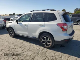2016 Subaru Forester XT Touring with VIN JF2SJGVC2GH447069, listed as a Copart auction lot 61259625 with 94,499 mi miles and Salvage title. Bid and sale history available at DreamBid. Image 2.