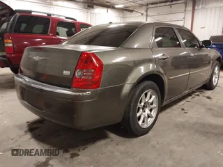 2010 Chrysler 300 Touring with VIN 2C3CA5CV9AH213299, listed as a IAAI auction lot 41754215 with 172,467 mi miles. Bid and sale history available at carsss.com. Image 4.
